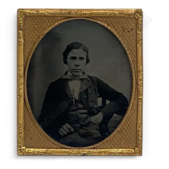 Gilt matt and framed ambrotype – seated youth,